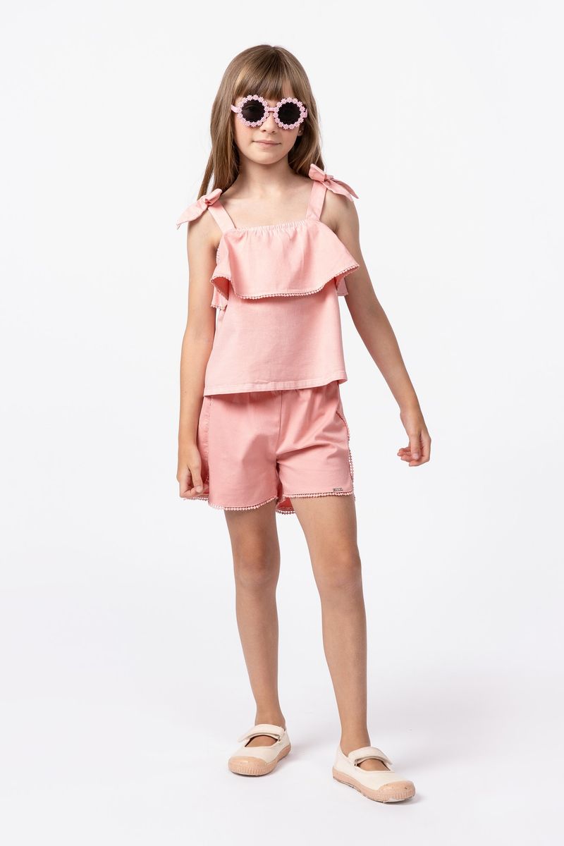 858024-Blusa-de-alca-em-sarja-com-laco-e-pompom-na-barra-do-babado-para-meninas