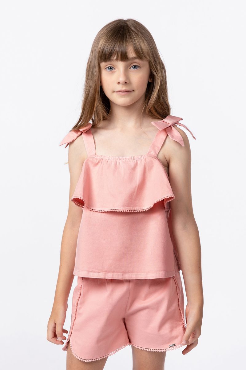 858024-Blusa-de-alca-em-sarja-com-laco-e-pompom-na-barra-do-babado-para-meninas