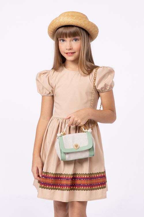 Vestido rodado em tricoline com elástico decorativo no barrado para menina