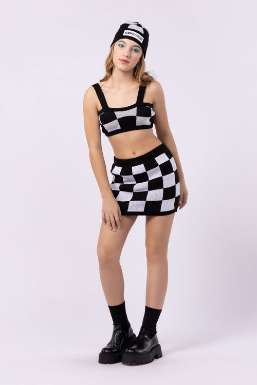 Top teen menina em tricô quadriculado
