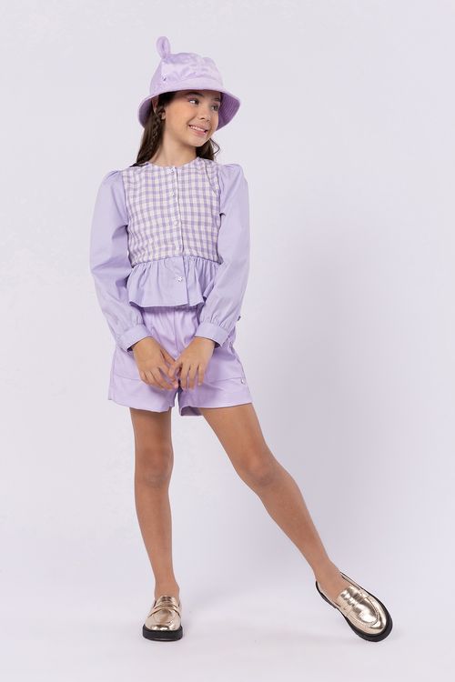 Short infantil para menina em couro com bolsos